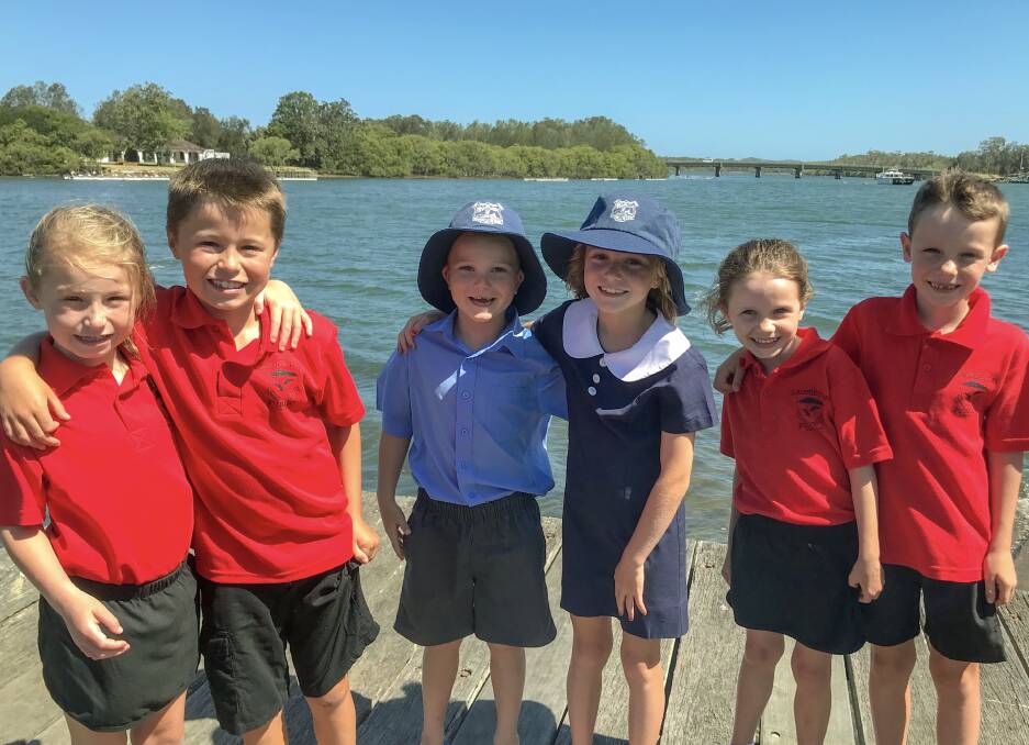 Together: Families welcoming their siblings into school. From left to right: Kiera and Curtis Ansell, Mitchel and Ciara Hoare, Eliza and Fynn Smith.