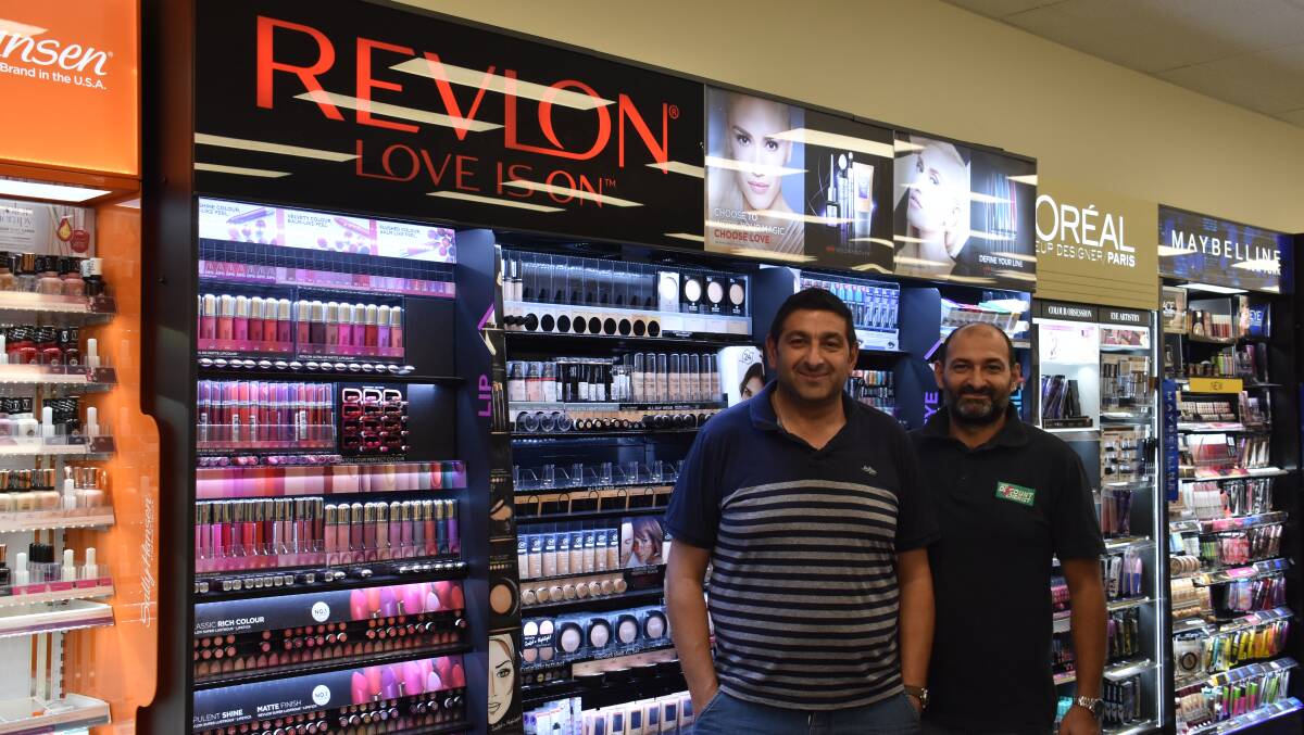 Getting ready: Fawaz and Said Khodary in the new superstore now located at Shop 1, 85 Bold Street, Laurieton.

