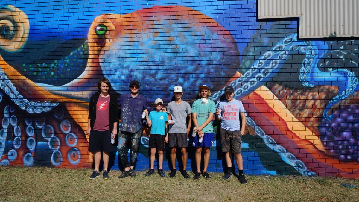 This ocean inspired mural in Rockingham was completed as part of a workshop run by Jerome and the participants pictured.