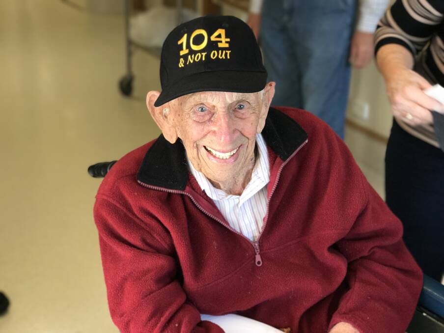 Happy days: Keith Dawson celebrating his 104th birthday.