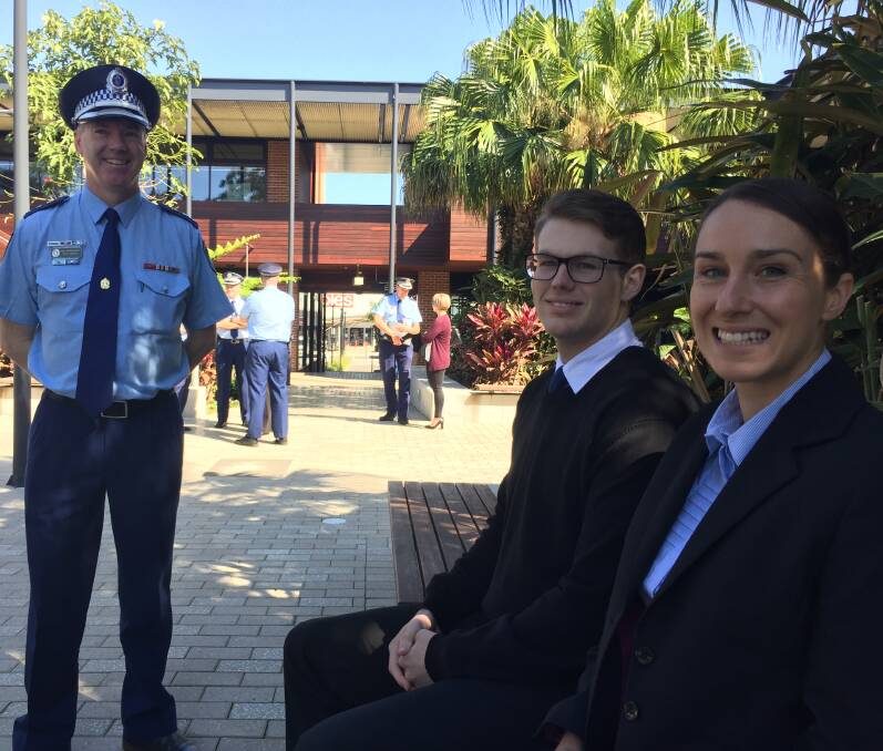 High praise: Commander of the NSW Police Academy, Chief Superintendent Rod Smith with course participants Kane Dennis and Ashley Strong.