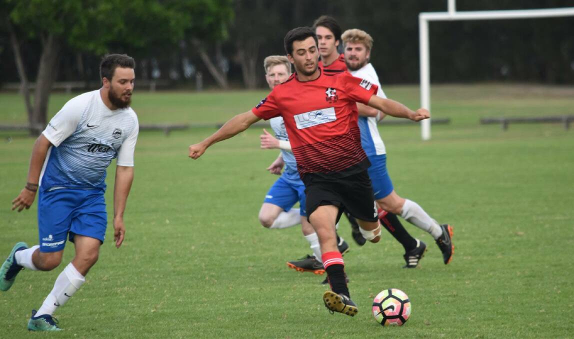 Two goals: Redbacks' Rob Holland netted two goals in his team's seven-goal thriller against the Taree Wildcats.