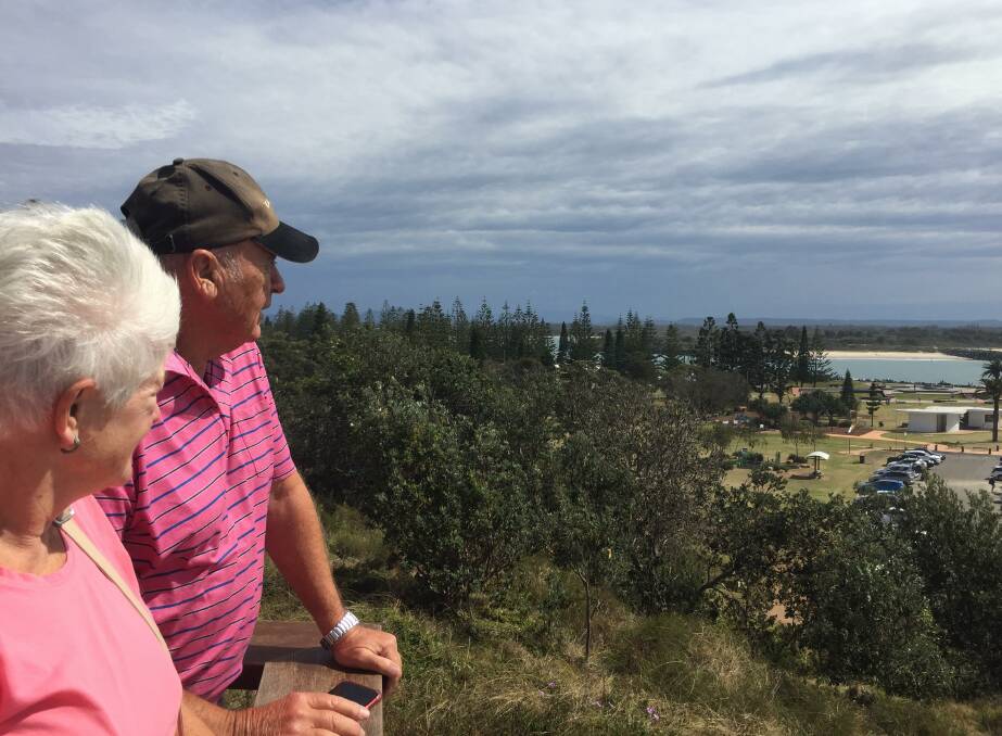 Weather change: Rod and Judy Bennett, from Melbourne watching from the safety of Lions Lookout as the storms approach from the west.