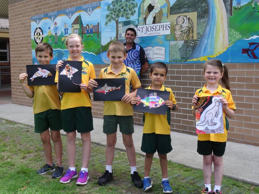 Culture: St Joseph's Primary School's Jack Wilson, Layla Armstrong, Patrick Harris, Evander White and Olivia Morgan with artist Tony Clark.