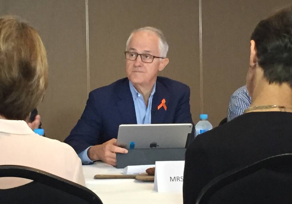Here to talk: Prime Minister Malcolm Turnbull on Wednesday hosted a roundtable in Port Macquarie to here from 12 self-funded retirees about an Opposition plan to change the existing tax imputation credit system. Photo: Peter Daniels