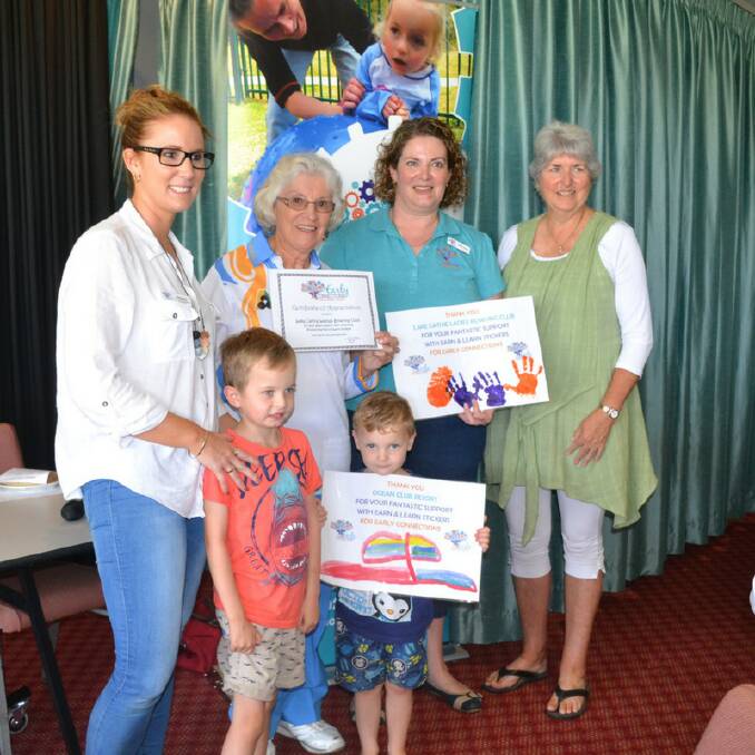 Wonderful help: Early Connections Occupational Therapist, Amanda Rouse, President Lake Cathie Ladies Bowling Club, Dorothy Lynch, Director Early Connections Beth Todd and Ocean Club Resort's Jill Howard with, front, Saxon White and Kye Holstein.