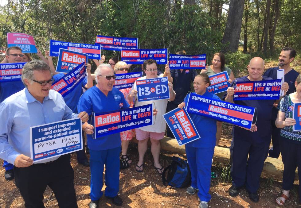 We want ratios: Nurses and midwives rallying to introduce staff ratios for all public hospitals. Country Labor candidate for Port Macquarie, Peter Alley, is on the left.