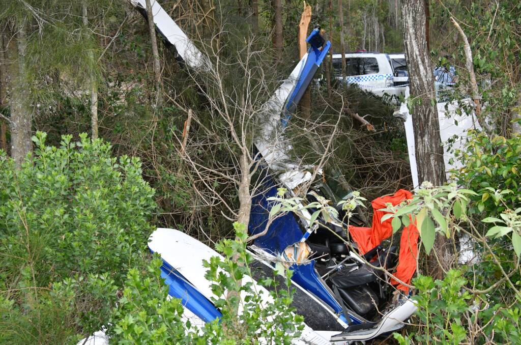 The plane came down in bush just beside the Pacific Highway.