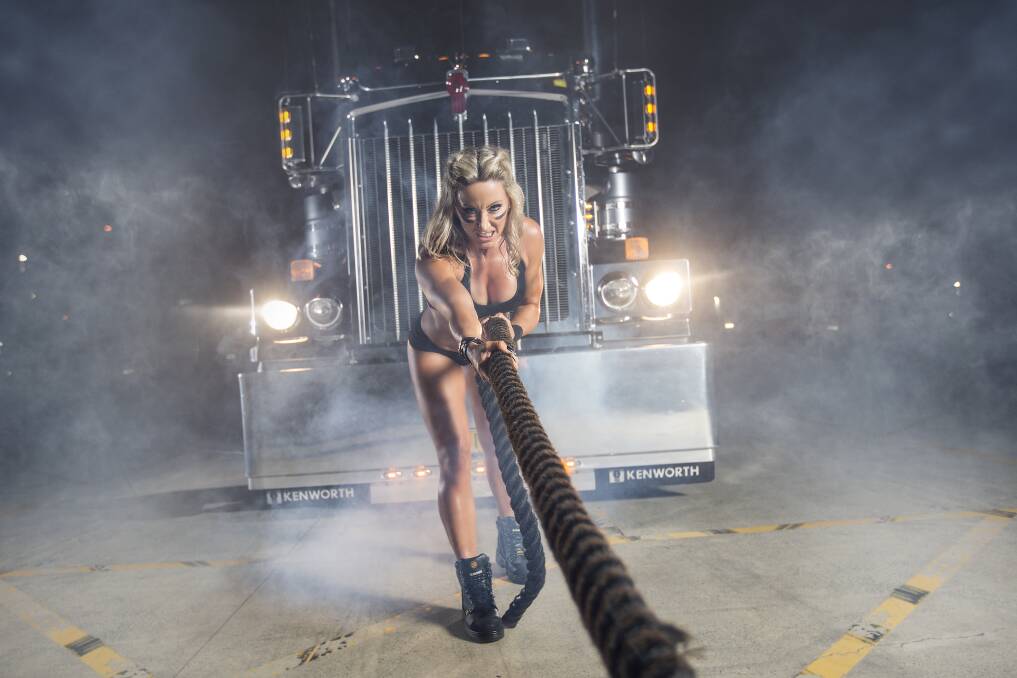 DOING IT FOR CHARITY: Nardia Styles, who grew up in Wauchope, pulls a truck to get into the Guinness Book of Records.