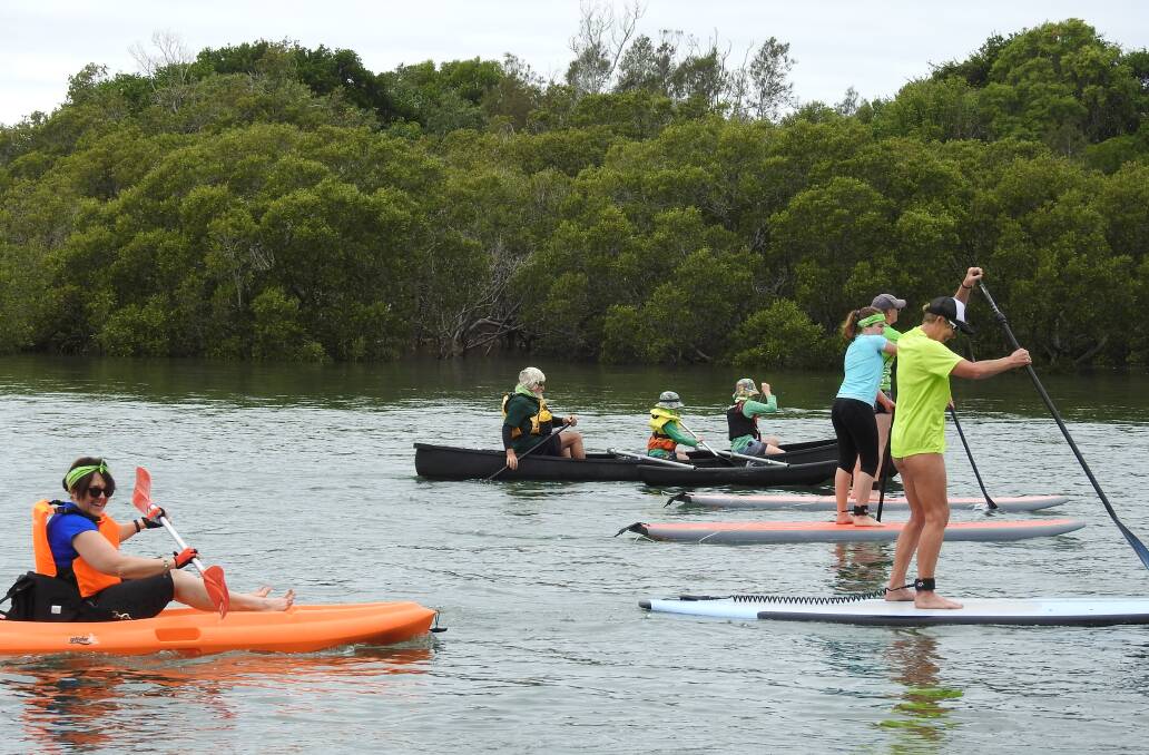 HAVING FUN: Some of the 50 people who came to Settlement Point to paddle for the mental health initiative, headspace, which helps young people.