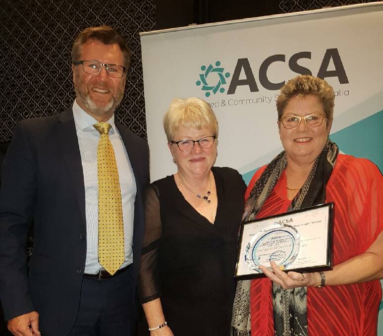 RECOGNITION: Bundaleer director Rod Barnaby, Interim CEO Louise Roberts and Manager of Quality & Clinical Governance Karen Slater with her award.