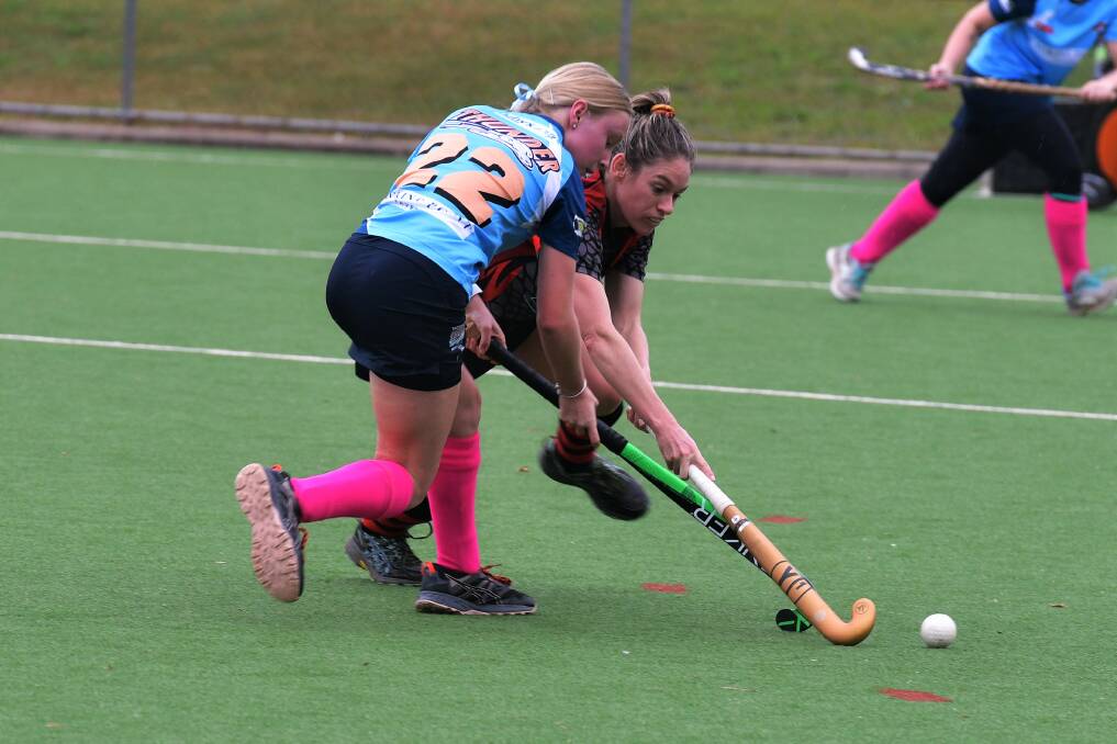 Our ball: Tacking Point Thunder Omni's Emersyn Smith battles for possession in Saturday's game. Photo: Paul Jobber