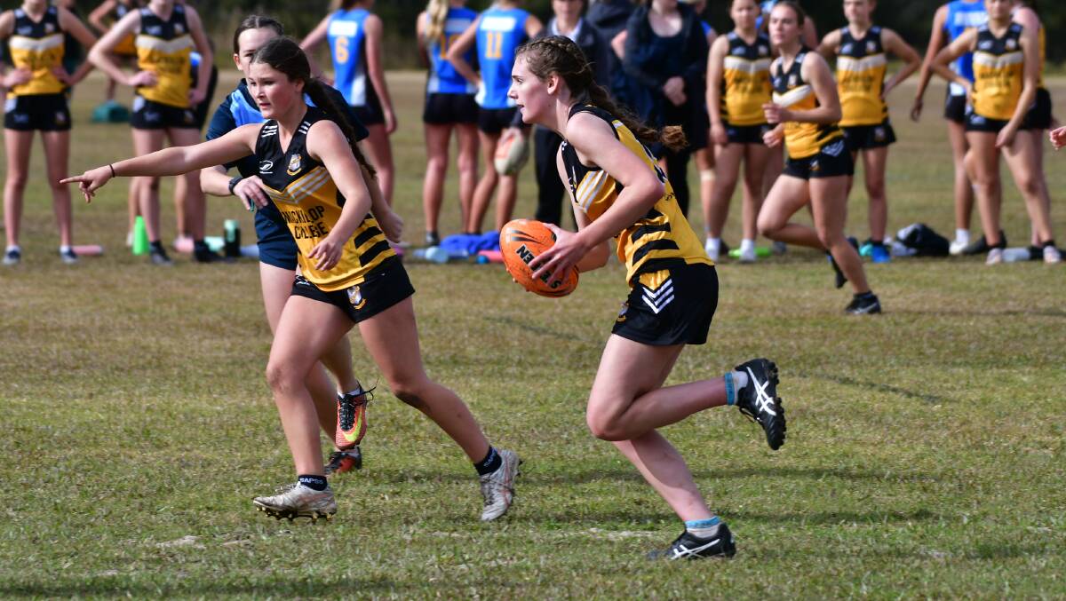 MacKillop College year 9/10 girls were competitive at the All Schools NSW Touch gala day. Photo: Paul Jobber