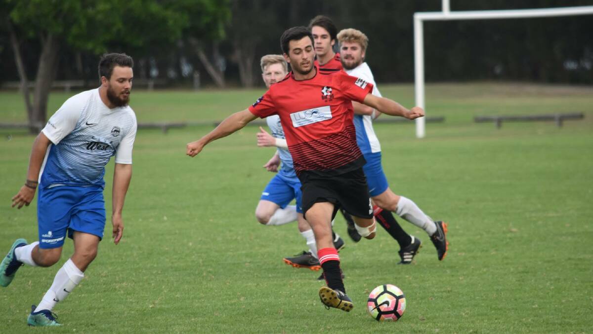 On the scoresheet: Rob Holland scored a double as Camden Haven Redbacks progressed to the third round of the FFA Cup on Sunday.