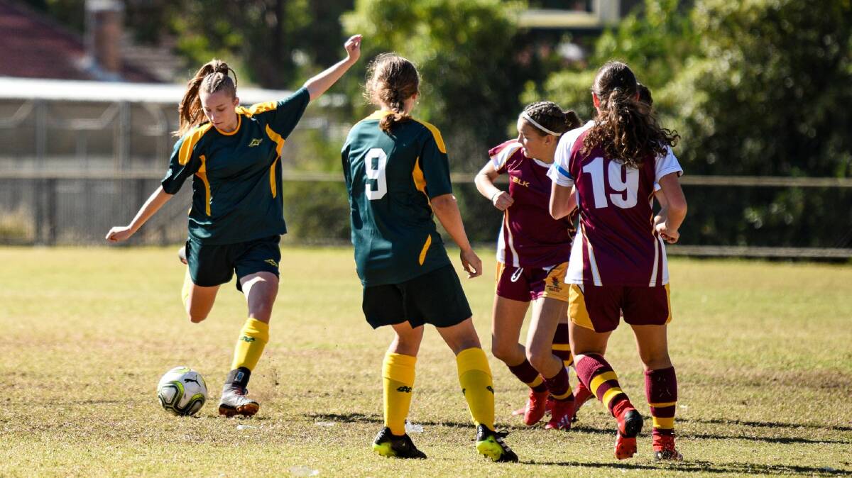 On the right path: Mia Bales puts boot to ball. Photo: Supplied/Mia Bales