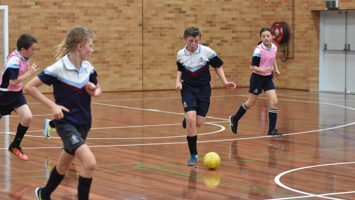 On the run: Michael Vandoros in action at the recent primary school futsal tournament.