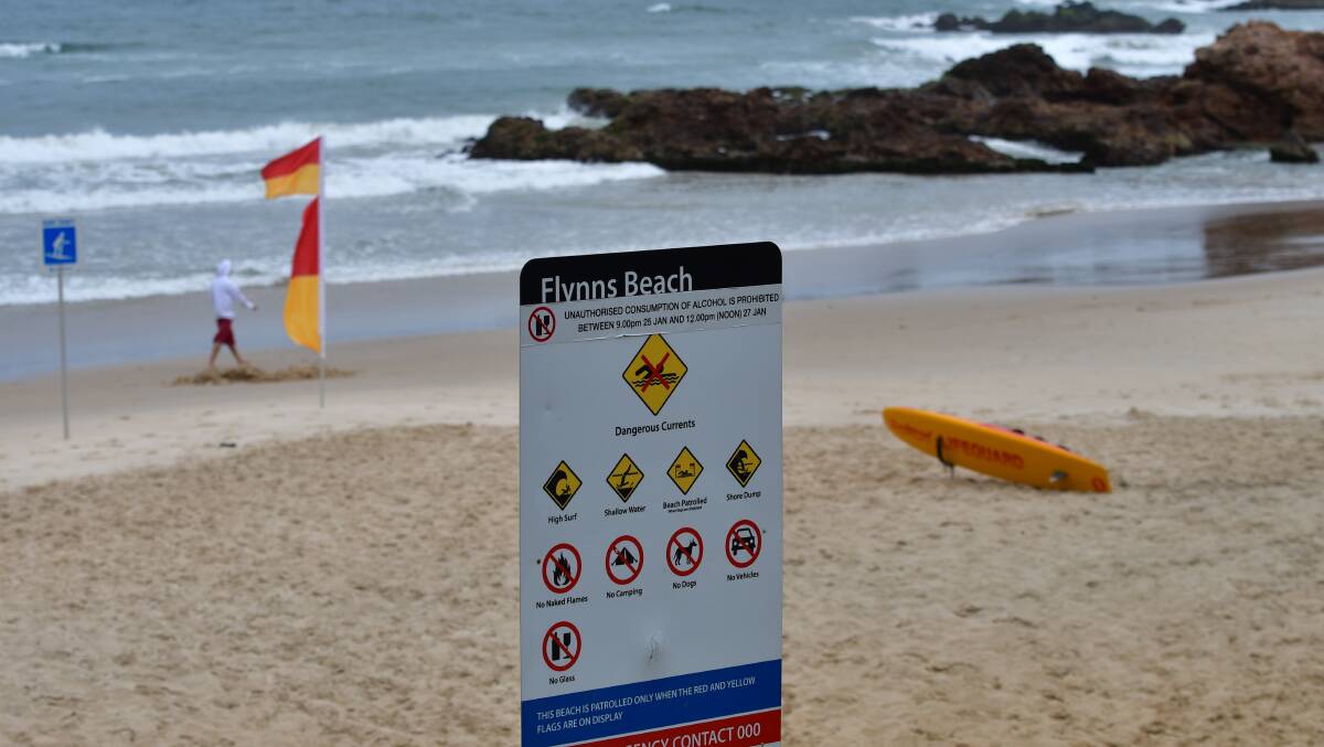 All done: The patrol flags have come down at Flynns Beach to mark the end of the surf life saving season. Photo: Paul Jobber