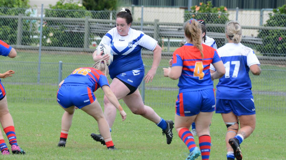 Naomi George takes the ball forward for North Coast at last year's Country Championships. Photo: Scott Calvin