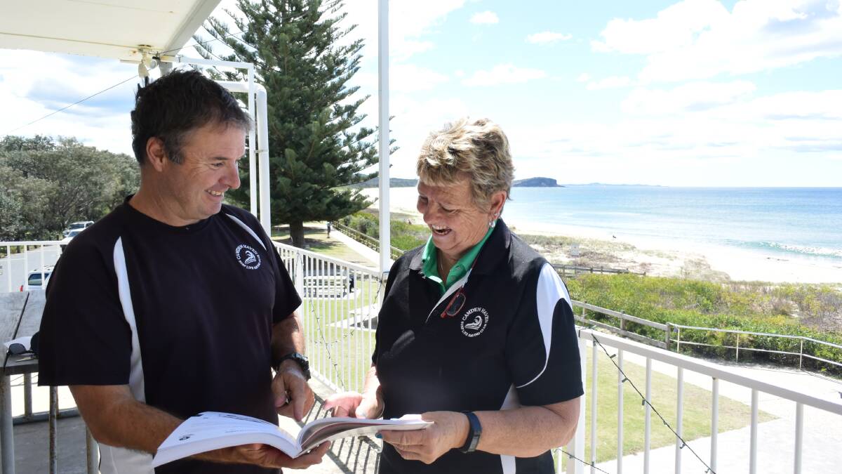 New hands: Glen O'Brien hands over the reigns to new Camden Haven Surf Club president Michelle Garvan. “Michelle will always be a big contributor to the club," Glen said. 