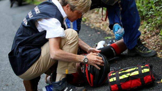 Richie Porte receives medical treatment on the roadside. Photo: Getty Images
