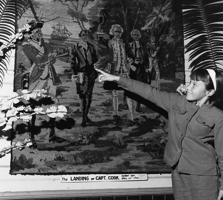REMEMBERING COOK: Susan Mudford admires the tapestry by W G Lappenden at the Captain Cook Bi-centenary art and historic exhibition.