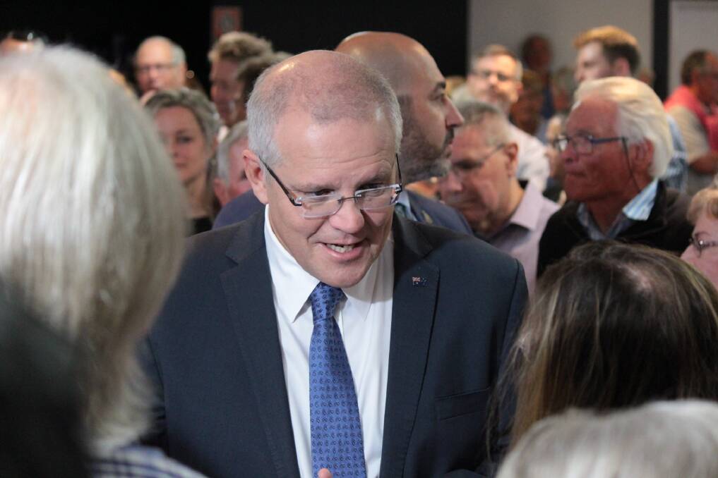 Visit: Scott Morrison greeting senior citizens at Port Panthers on May 9. Photo: Tracey Fairhurst.