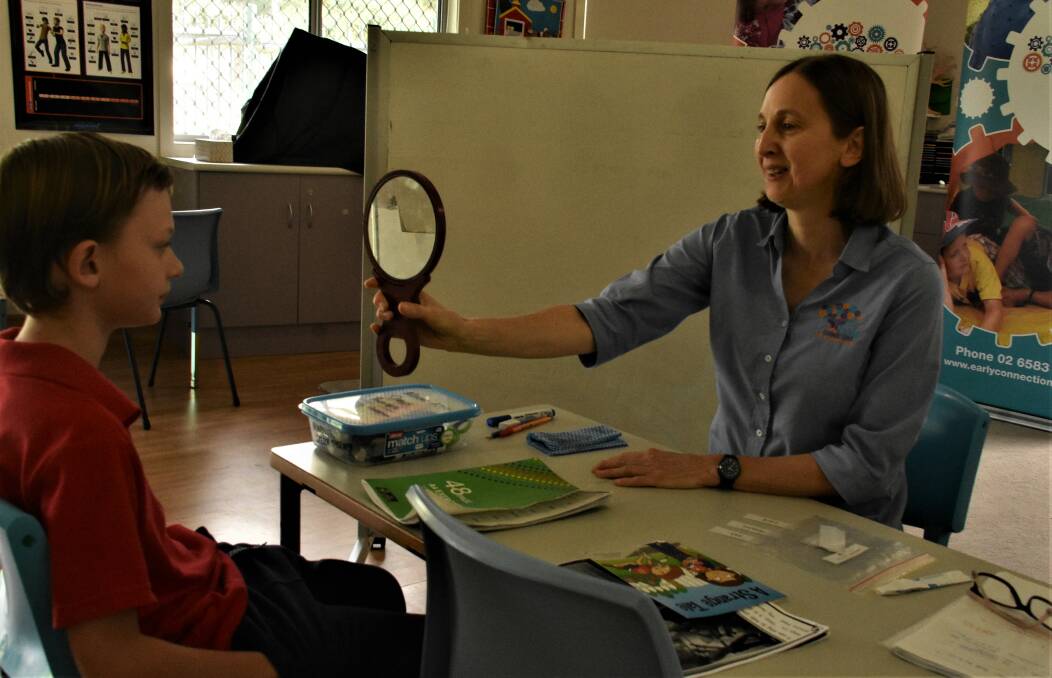 Helping hand: Speech pathologist Mary Cameron with Marcus. Photo: Carla Mascarenhas