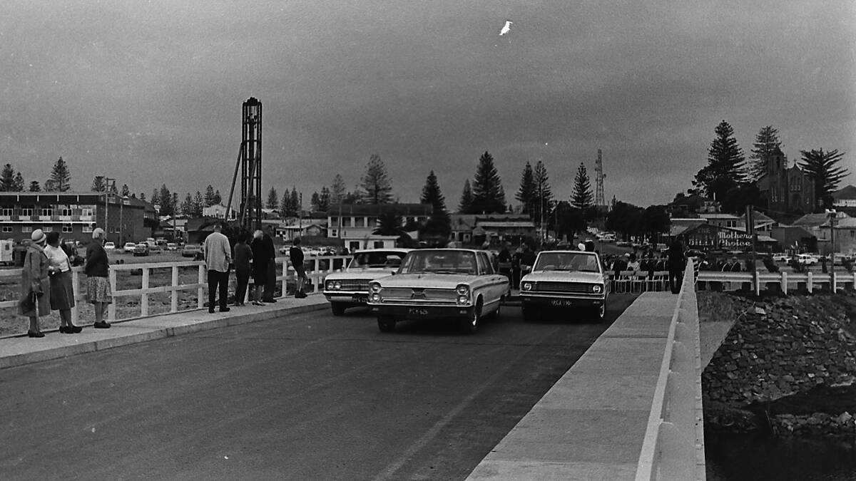 First cars: These cars are the first to travel across the Sesquicentenary Bridge following its official opening in June, 1968.