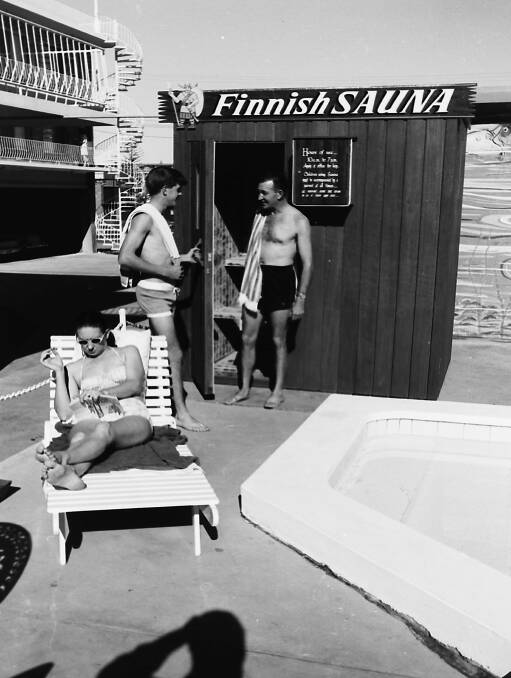 Hot spot: Beachfront Motel manager Max Brace with son Stephen outside the motels Finnish sauna, 1969.