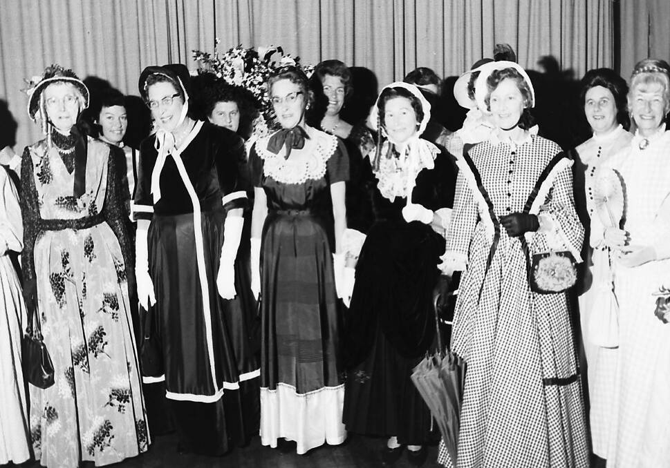 Back in time: Some of the many women who dressed colonial style at the Church of England flower show, 1968.