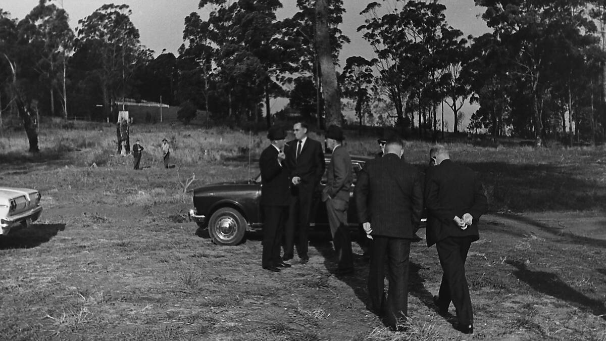 Not horsing around: The Minister for Lands, Tom Lewis stands between Athol Platt and the Under Secretary for Lands, Ray Sinclair at Port Macquarie’s new race track, 1968.