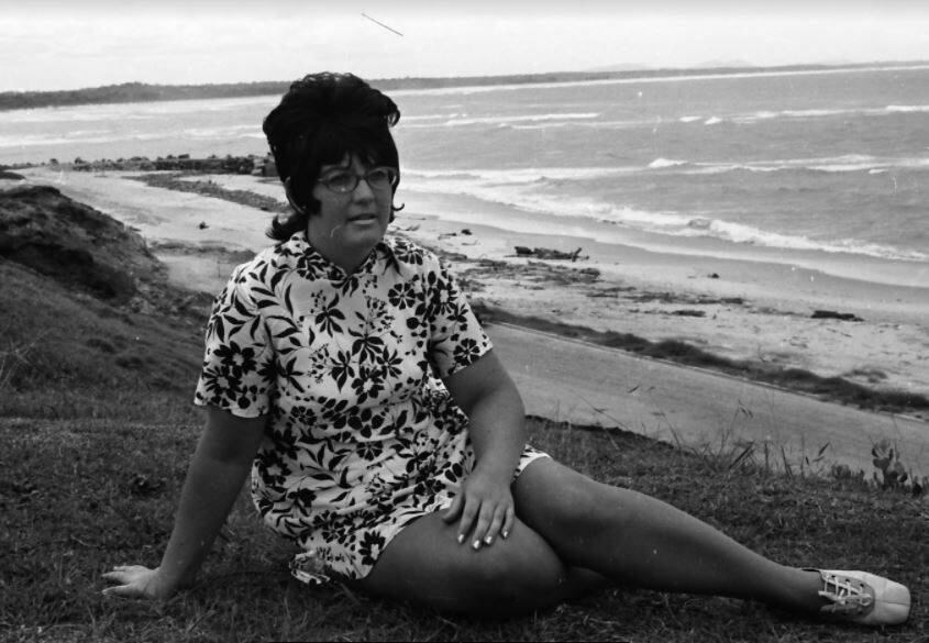 Ready for fundraising: Carnival Queen candidate Jacky Buchanan relaxing at Town Beach, 1971.Photos: supplied by Port Macquarie Museum