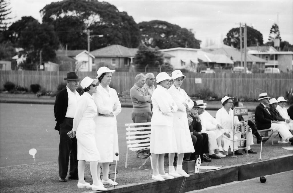 Tight game: Spectators and other team members watch on at the mixed fours championships, 1970. Photo: supplied by Port Macquarie Museum.