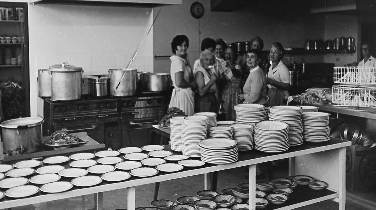 Great work: RSL Women’s Auxiliary members prepare to host the Armistice Day dinner, 1968. Photo supplied by Port Macquarie Museum.
 