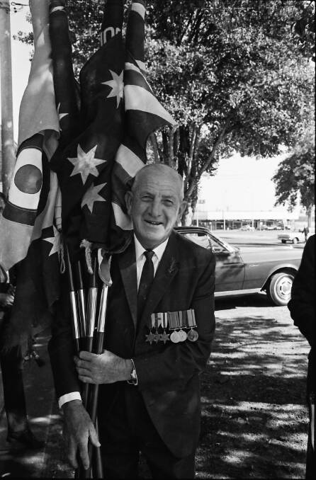 READY: Life Member of the RSL Club, Percy Heath, prepares for the Anzac Day march, 1971.