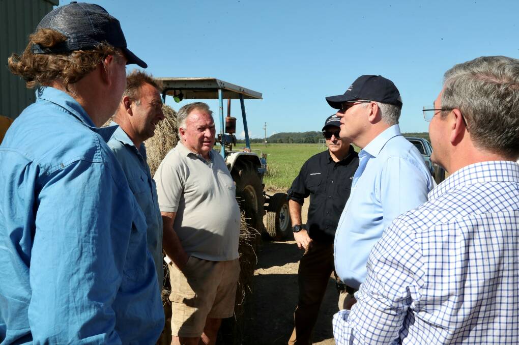 Primary producer grants: Prime Minister Scott Morrison and Lyne MP Dr David Gillespie meet with farmers on the Mid-North Coast affected by floods.