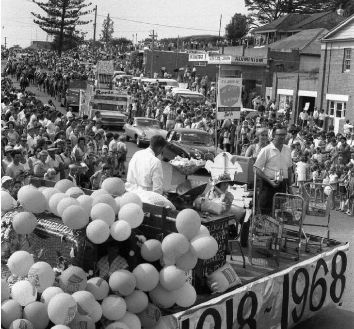 Crowds: Port Macquarie's sesqui-centenary marked fittingly with huge Carnival of the Pines Easter procession along Williams Street, 1968.