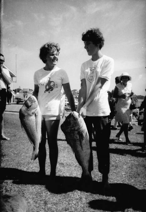 Well done ladies: Chrissie and Anne Cooper with their snapper catches, 1971.