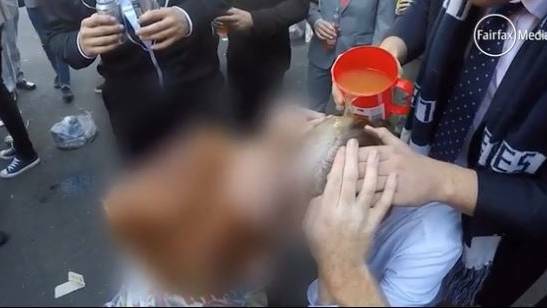 WIDESPREAD: Graphic video shows University of Newcastle students drinking alcohol of genitals, participating in hazings of new college residents. The video was released ahead of the Red Zone report. 
