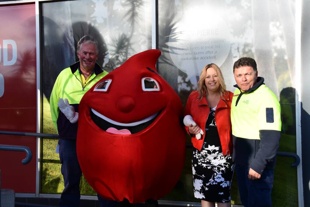 GREAT CAUSE: Council workers with Billy the blood drop and mayor Peta Pinson at the Blood Centre in Port Macquarie. PHOTO: Laura Telford.