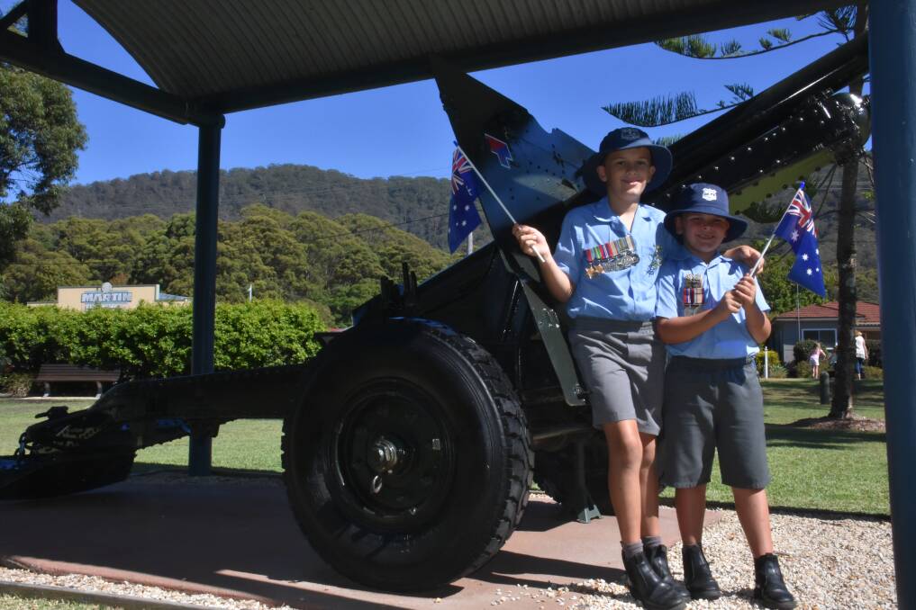 REPLICA: Jack and Lachlan Wilson with the replica gun their Poppy would have been around. PHOTO: Laura Telford.