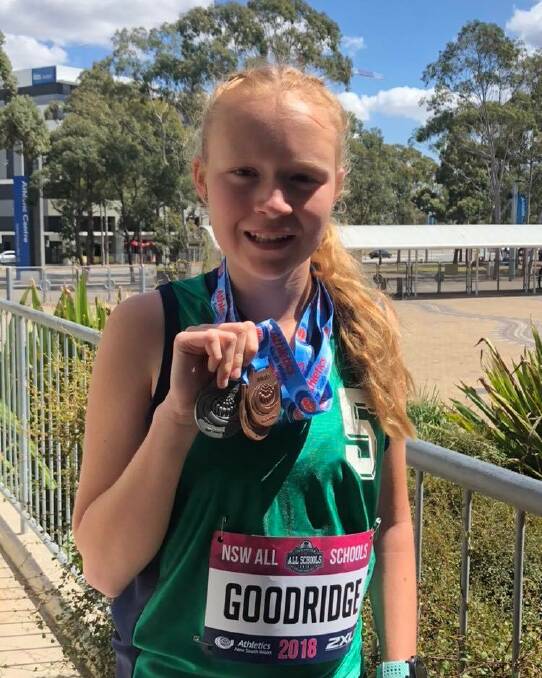 High achiever: Madelaine came second in shot put, third in long jump, third in discus, eighth in the 100m and ninth in the 200 metre. Photo: supplied .