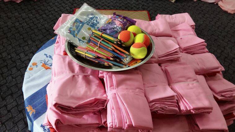 Robes and stationary for the orphans. 
