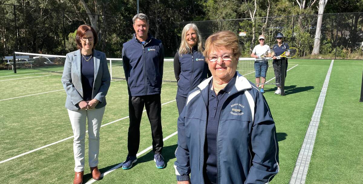 Bonny Hills Tennis Club president Joan Evelyn (front), Member for Port Macquarie Leslie Williams, club vice president Geoff Carter, club secretary Janie Carter and club tennis players Anne McGregor with Judith Stewart (back). 