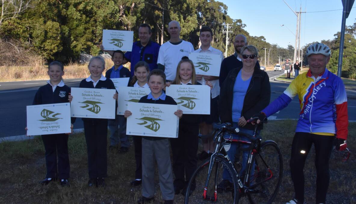Celebration: Members of the Schools to Schools committee at the intersection of Sirius Drive and Ocean Drive. Footpath funding for between Brotherglen Drive to Sirius Drive in Lakewood has been secured. 
