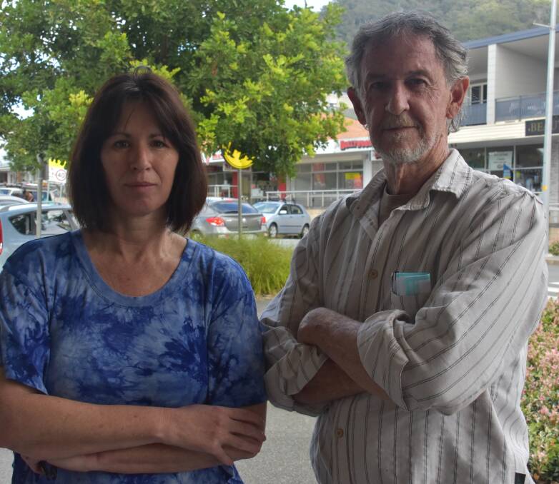 Not happy: Kendall residents David Adamson and Deb Bennett said while the number of home sites has been reduced, the overall model is incompatible with the village’s infrastructure, facilities and the overall community. 