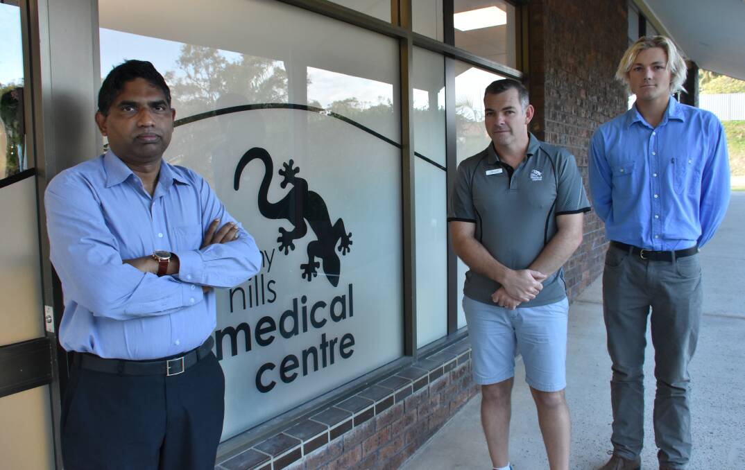 Increased pressure: Bonny Hills Medical Centre owner and doctor Sam Nelapati, nurse Brett Lewis-Bain and medical student Jacob van der Linden. 