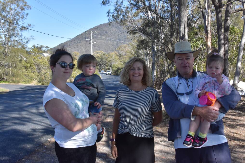 Support: Kendall Rutledge with her son Lachlan, Penny Small and Murray Rutledge with his granddaughter Matilda. 