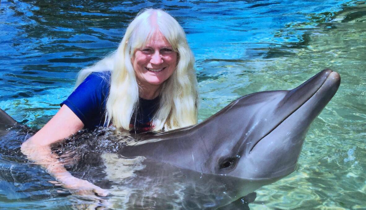 Di has swam with dolphins at Coffs Harbour. Photo: supplied. 