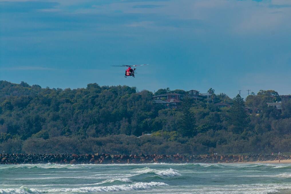 Westpac Rescue Helicopter searches from the air south of Port Macquarie on December 8. Photo: Glyn Jones.